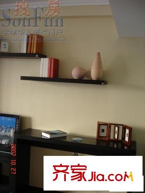青島假日公寓套一戶型客廳一角
