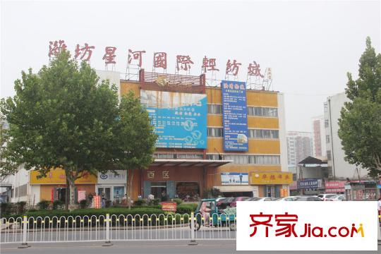 興源國(guó)際城項(xiàng)目斜對(duì)面國(guó)際輕紡城
