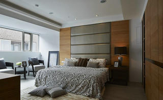 140平现代风格三居装修卧室搭配图
