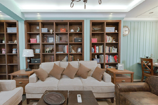大面积的沙发背景书架实用又大气,充满了雅致的书香气质