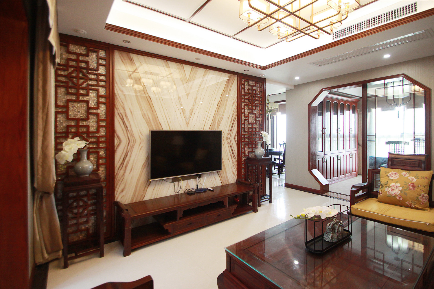 中式风格,四房装修,130平米装修,20万以上装修,客厅,电视背景墙,暖色调