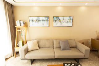 74平米二居室沙发背景墙装修效果图