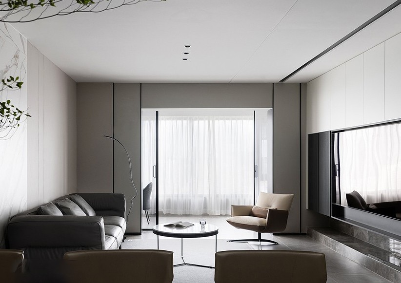 客厅装饰简约,背景墙与电视柜的线条元素无形中拉伸空间的纵深感.
